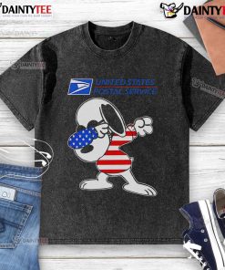 Awesome USPS Snoopy dabbing graphic on a washed t-shirt, perfect for fans of vintage cartoon apparel.