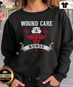 Alt Text: Awesome wound care nurse sweatshirt featuring caduceus, medical symbol, nurse hat, and heartbeat design.
