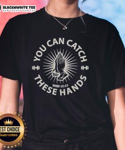 Awesome 'You Can Catch These Hands' ladies tee featuring bold graphic design on a stylish black shirt for casual wear.