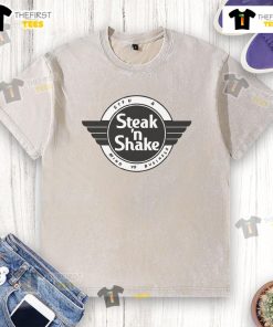 Awesomesteak-N-Shake logo on a washed t-shirt, showcasing a trendy and casual style for food lovers.