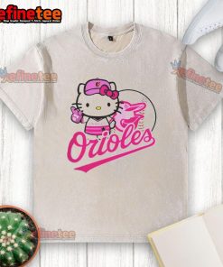 Alt Text: Cute Baltimore Orioles Hello Kitty 2025 baseball washed t-shirt featuring a playful design for fans.
