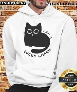 Cute cat wearing a 'Lucky Charm' hoodie, showcasing adorable style and personality in cozy pet fashion.