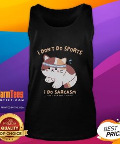 Cute cat wearing a tank top that says 'I don't do sports, I do sarcasm' - perfect for cat lovers and humor fans.