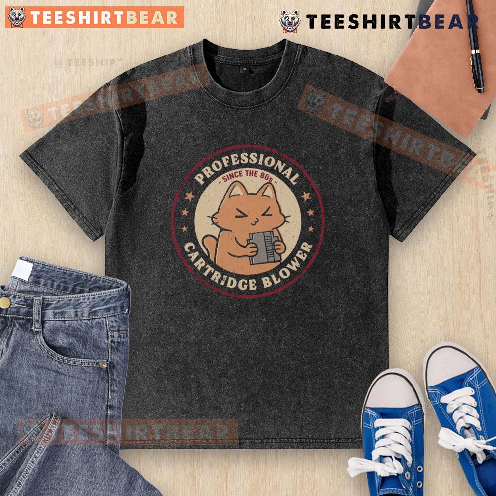 Cute Cat Pro Cartridge Blower Since The 80S Washed T Shirt Cute cat graphic on a washed T-shirt featuring 'Pro Cartridge Blower Since the 80s' design for cat lovers.