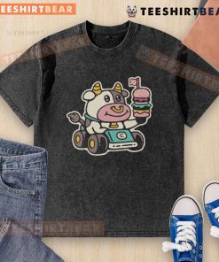 Cute cow burger racer graphic on a washed t-shirt, perfect for fast food lovers and casual wear enthusiasts.