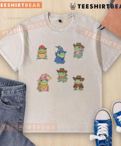 Adorable cute frogs dressed as cowboys and witches on a washed t-shirt, perfect for frog lovers and unique fashion.