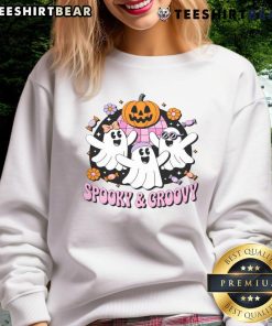 Cute Halloween spooky groovy retro ghosts sweatshirt featuring playful ghost designs in vibrant colors.