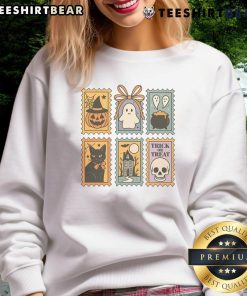 Alt Text: Cute Halloween stamp featuring a ghost, pumpkin, and cat on a trick-or-treat sweatshirt design.