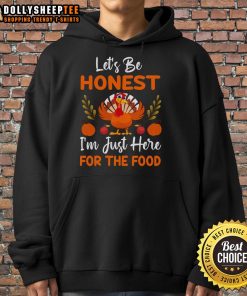 Cute Thanksgiving hoodie with 'Let's Be Honest, I'm Just Here For The Food' and a turkey graphic, perfect for holiday gatherings.