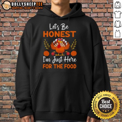 Cute Thanksgiving hoodie with 'Let's Be Honest, I'm Just Here For The Food' and a turkey graphic, perfect for holiday gatherings.