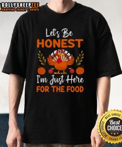 Alt Text: Cute Thanksgiving turkey t-shirt with 'Let's Be Honest I'm Just Here For The Food' slogan, perfect for holiday celebrations.