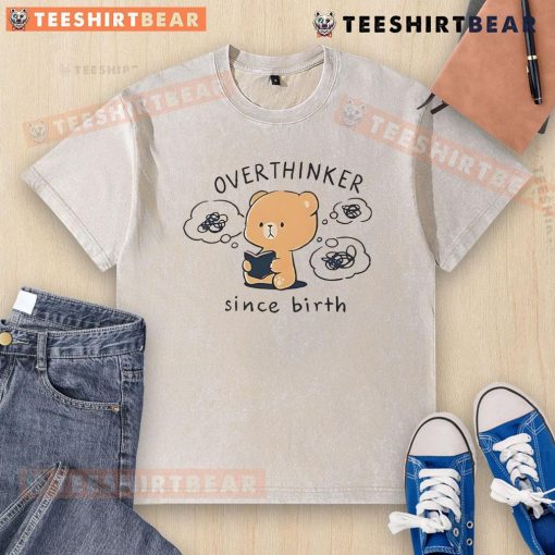 Cute mocha bear graphic on a washed t-shirt, perfect for overthinkers since birth, showcasing playful design.