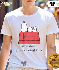 Alt Text: Cute motivational Snoopy 'Slow Down You're Doing Fine' t-shirt design featuring Snoopy and a positive message.