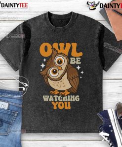 Cute owl design on a washed t-shirt, perfect for owl lovers and casual wear enthusiasts. Adorable and eye-catching!