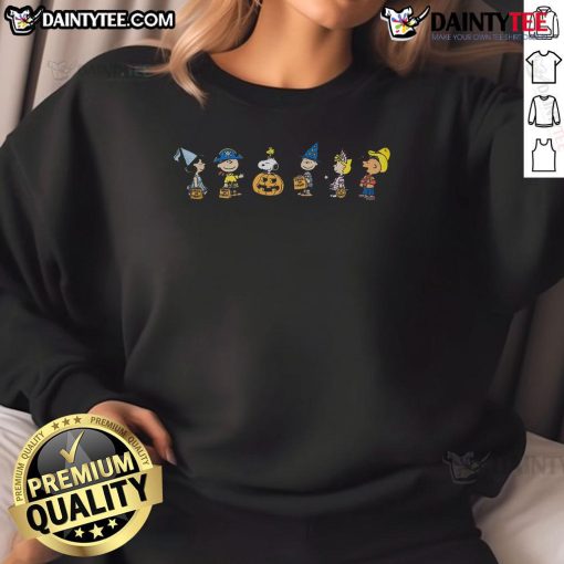 Adorable Peanuts Halloween costumes sweatshirt featuring Charlie Brown and Snoopy, perfect for holiday festivities.
