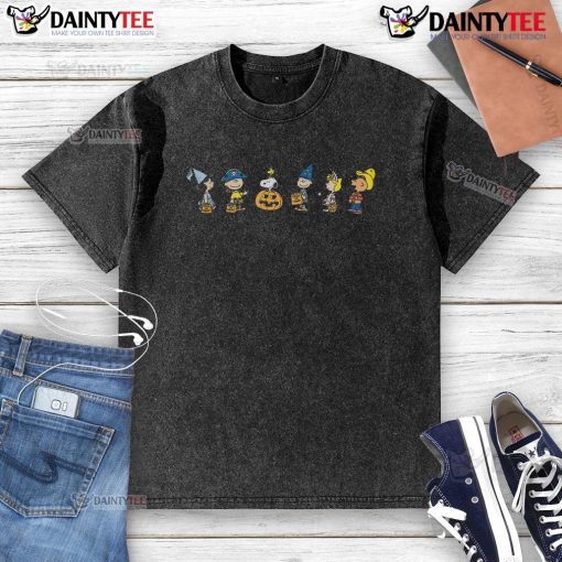 Alt Text: Cute Peanuts Halloween costumes on a washed T-shirt featuring Charlie Brown and Snoopy in festive attire.