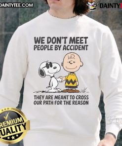 Adorable Snoopy sweatshirt with 'We Don't Meet People By Accident' quote, perfect for Peanuts fans and cozy style.