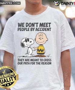 Alt Text: Cute Peanuts Snoopy t-shirt with quote We Don't Meet People By Accident highlighting friendship and fate.