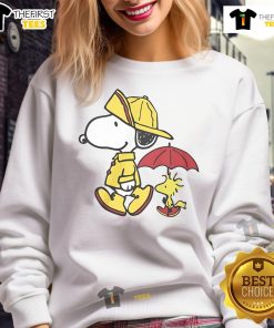 Alt Text: Cute Peanuts Snoopy and Woodstock sweatshirt perfect for rainy days, featuring vibrant colors and cozy design.
