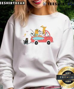 Adorable pets traveling in style wearing a cute sweatshirt, perfect for pet lovers on the go.