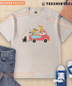 Cute pets traveling while wearing a pretty washed t-shirt, showcasing their adventurous spirit and adorable style.
