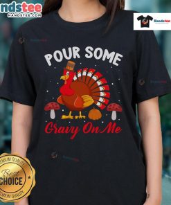 Alt Text: Cute Thanksgiving turkey graphic on a ladies tee with humorous 'Pour Some Gravy On Me' text for holiday fun.
