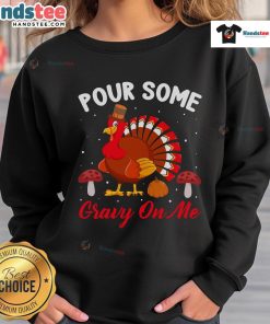 Alt Text: Cute Thanksgiving turkey sweatshirt featuring humorous 'Pour Some Gravy On Me' design for holiday fun.