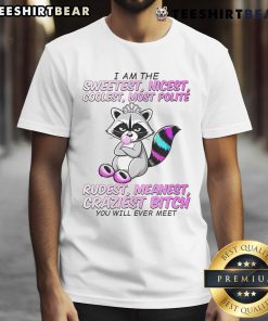 Cute raccoon wearing a I Am The Sweetest Nicest Coolest t-shirt, showcasing its adorable personality in a playful pose.
