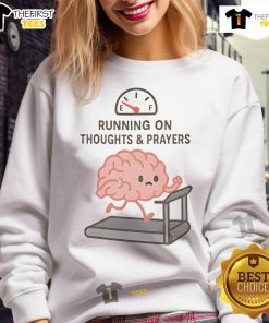 Alt Text: Cute sweatshirt featuring Running on Thoughts and Prayers slogan, perfect for casual wear and expressing humor.