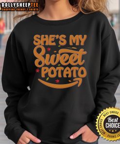 Cute 'She's My Sweet Potato' Thanksgiving sweatshirt featuring a playful design for festive fall celebrations.