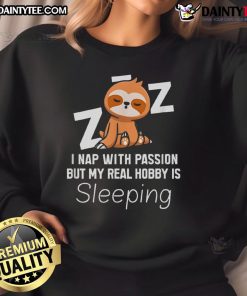 Alt Text: Cozy sweatshirt featuring a cute sloth with the phrase I nap with passion, but my real hobby is sleeping.
