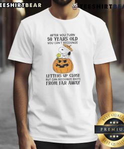 Alt Text: Cute Snoopy t-shirt design featuring 'After You Turn 50, You Can't Recognize Letters Up Close' text.