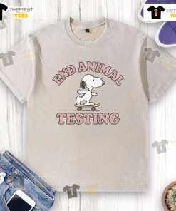 Alt Text: Cute Snoopy end animal testing graphic on a washed t-shirt promoting animal welfare and awareness.