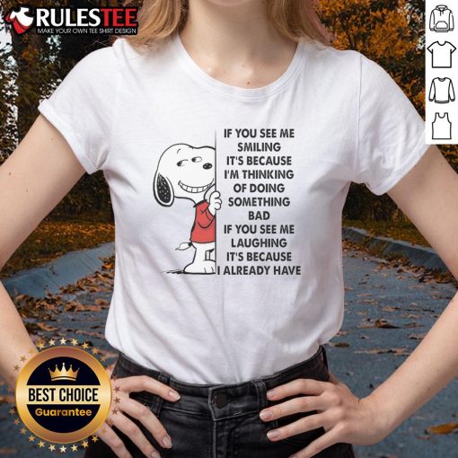 Cute Snoopy tee for ladies with 'If you see me smiling, it's because I'm thinking of doing something bad' quote.
