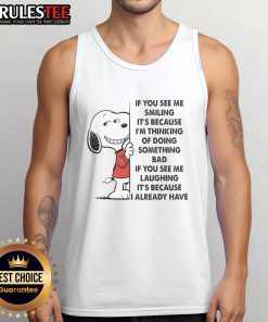 Alt Text: Cute Snoopy tank top with 'If you see me smiling, it's because I'm thinking of doing something bad' design.