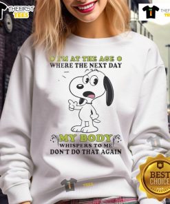Alt Text: Cute Snoopy sweatshirt featuring the quote about aging and body aches, perfect for casual wear and Snoopy fans.