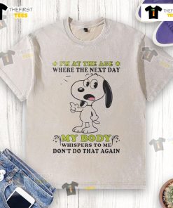 Alt Text: Cute Snoopy graphic on a washed t-shirt with the quote about body whispers, perfect for relaxed, humorous fashion.