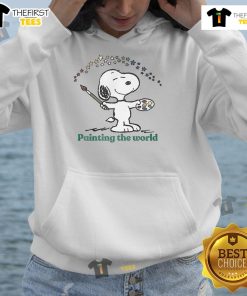 Alt Text: Cute Snoopy painting the world design on a cozy hoodie, perfect for fans of Peanuts and stylish casual wear.