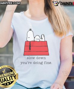Alt Text: Cute Snoopy Slow Down, You're Doing Fine ladies tee featuring a colorful graphic design perfect for casual wear.