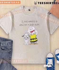 Cute Snoopy and Charlie Brown on a washed t-shirt with the phrase 'I Just Wanted to Send You a Smile Today.'