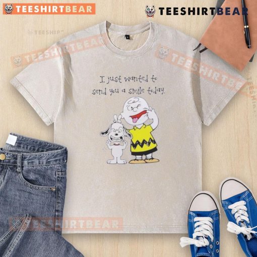 Cute Snoopy and Charlie Brown on a washed t-shirt with the phrase 'I Just Wanted to Send You a Smile Today.'