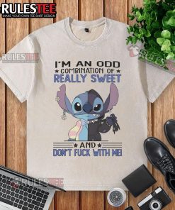 Alt Text: Cute Stitch I'm An Odd Combination Of Really Sweet And Don't Fck With Me washed t-shirt design featuring vibrant colors.