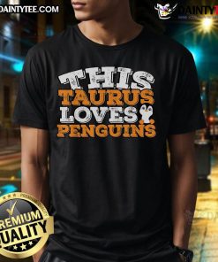 Alt Text: Cute Taurus loves penguins t-shirt featuring a playful design with a Taurus symbol and adorable penguins.
