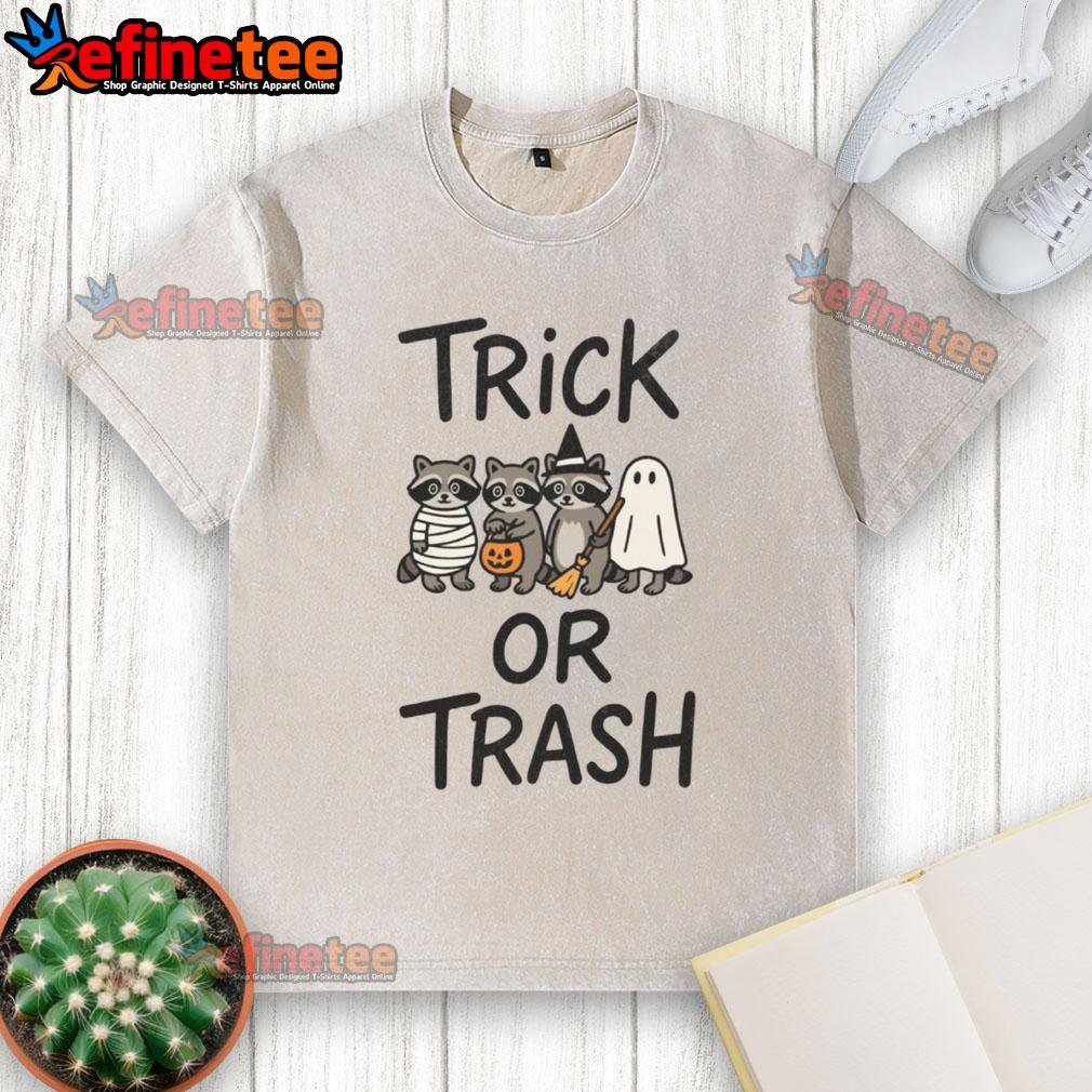 Cute Trick Or Trash Halloween Raccoon Washed T Shirt Adorable raccoon graphic on a washed t-shirt for Halloween, perfect for trick or treating or festive fall wear.