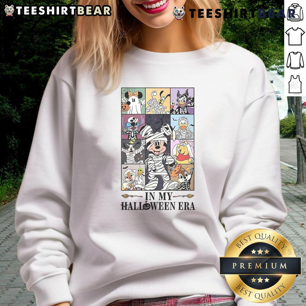 Cute Vintage Disney In My Halloween Era Sweatshirt Cute vintage Disney In My Halloween Era sweatshirt featuring classic Disney characters in festive Halloween colors.