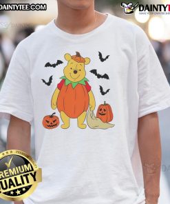 Alt Text: Cute Winnie The Pooh Halloween t-shirt featuring a big pumpkin design, perfect for festive celebrations and fans.