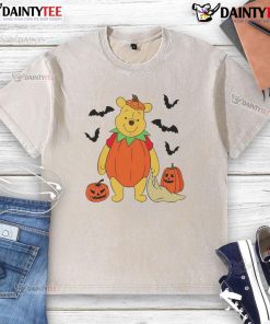 Alt Text: Cute Winnie the Pooh Halloween t-shirt featuring a big pumpkin design, perfect for festive celebrations.