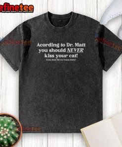 Funny T-shirt by Dr. Matt: 'Never Kiss Your Cat Less Than 7 Times Daily' with a playful cat graphic.