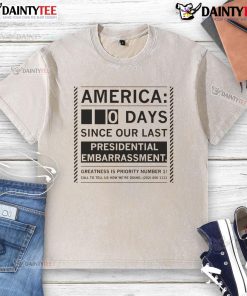 Funny America 0 Day Since Our Last Presidential Embarrassment T-Shirt featuring humorous graphic and bold text design.