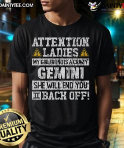Funny 'Attention Ladies: My Girlfriend Is A Crazy Gemini' T-Shirt showcasing humor and astrology for Gemini lovers.